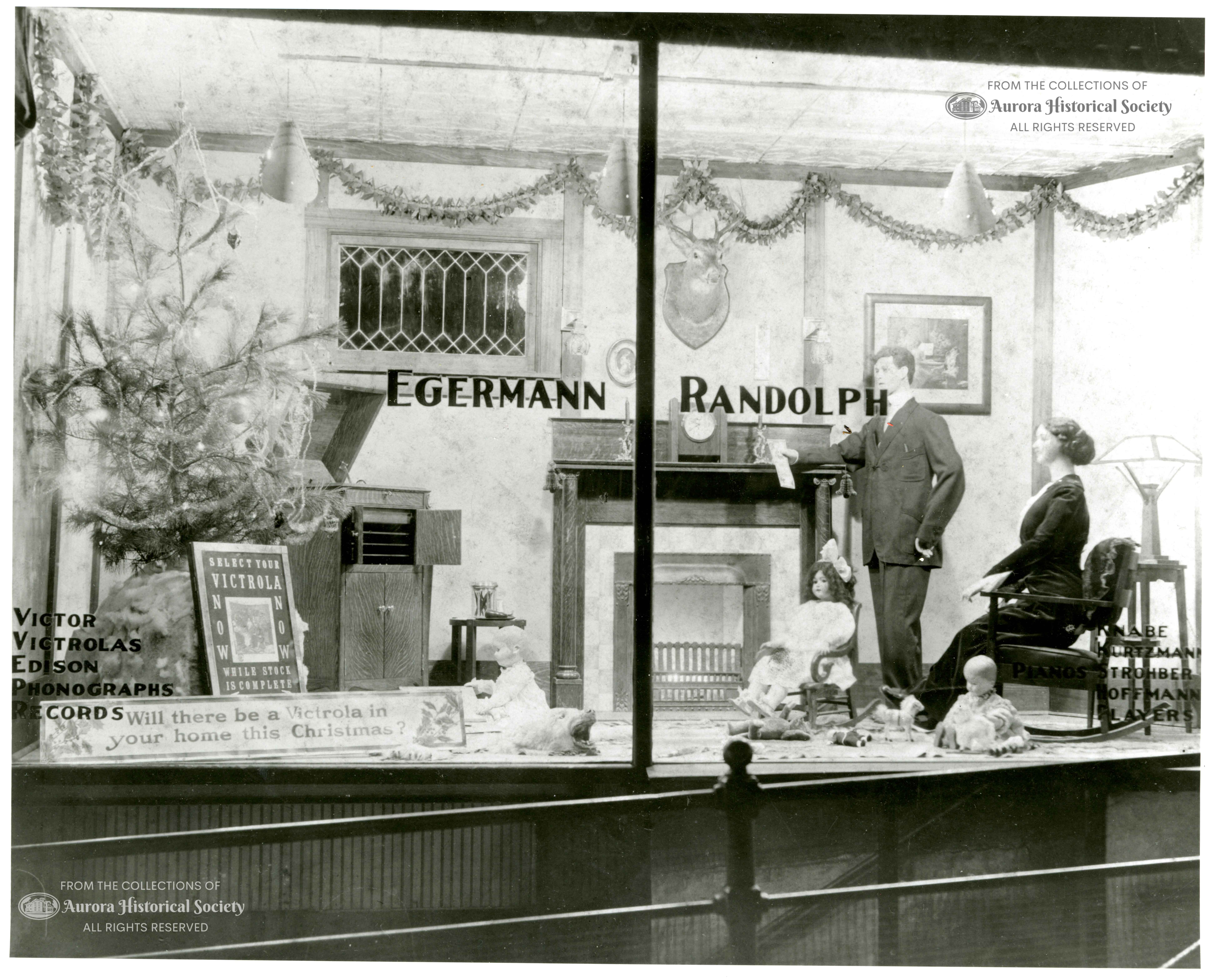 Christmas display in Egermann Randolph music store window East Downer at LaSalle about 1915 (Aurora Historical Society Photo)